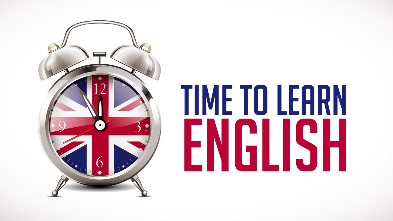 Alarm clock with british flag on clock face - learning concept